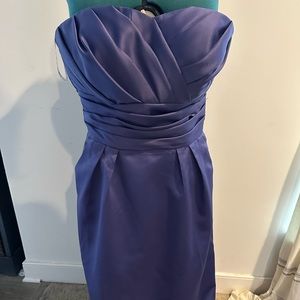 Purple strapless gown. Floor length. Hemmed. Some scuffs and pilling (pictured)